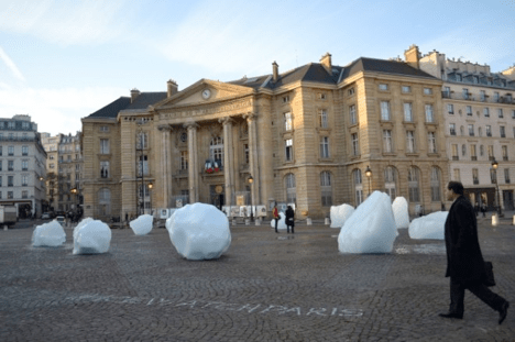 Melting ice clock art installation